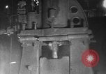 Image of Steam driven hammer forges hot steel billets into Studebaker engine parts South Bend Indiana USA, 1920, second 21 stock footage video 65675071728