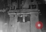 Image of Steam driven hammer forges hot steel billets into Studebaker engine parts South Bend Indiana USA, 1920, second 22 stock footage video 65675071728