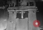 Image of Steam driven hammer forges hot steel billets into Studebaker engine parts South Bend Indiana USA, 1920, second 23 stock footage video 65675071728