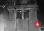 Image of Steam driven hammer forges hot steel billets into Studebaker engine parts South Bend Indiana USA, 1920, second 24 stock footage video 65675071728