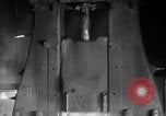 Image of Steam driven hammer forges hot steel billets into Studebaker engine parts South Bend Indiana USA, 1920, second 31 stock footage video 65675071728