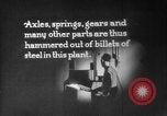 Image of Steam driven hammer forges hot steel billets into Studebaker engine parts South Bend Indiana USA, 1920, second 50 stock footage video 65675071728