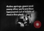Image of Steam driven hammer forges hot steel billets into Studebaker engine parts South Bend Indiana USA, 1920, second 52 stock footage video 65675071728