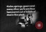 Image of Steam driven hammer forges hot steel billets into Studebaker engine parts South Bend Indiana USA, 1920, second 56 stock footage video 65675071728