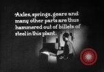 Image of Steam driven hammer forges hot steel billets into Studebaker engine parts South Bend Indiana USA, 1920, second 60 stock footage video 65675071728