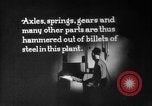 Image of Steam driven hammer forges hot steel billets into Studebaker engine parts South Bend Indiana USA, 1920, second 61 stock footage video 65675071728