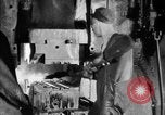 Image of Steam driven hammer forges hot steel billets into Studebaker engine parts South Bend Indiana USA, 1920, second 62 stock footage video 65675071728