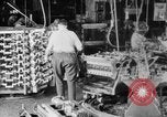Image of Assembling engines in an Studebaker automobile plant South Bend Indiana USA, 1920, second 8 stock footage video 65675071729