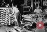 Image of Assembling engines in an Studebaker automobile plant South Bend Indiana USA, 1920, second 10 stock footage video 65675071729