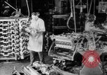 Image of Assembling engines in an Studebaker automobile plant South Bend Indiana USA, 1920, second 11 stock footage video 65675071729