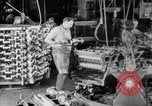 Image of Assembling engines in an Studebaker automobile plant South Bend Indiana USA, 1920, second 12 stock footage video 65675071729