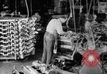 Image of Assembling engines in an Studebaker automobile plant South Bend Indiana USA, 1920, second 13 stock footage video 65675071729