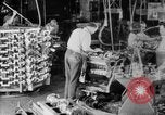 Image of Assembling engines in an Studebaker automobile plant South Bend Indiana USA, 1920, second 14 stock footage video 65675071729