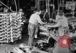Image of Assembling engines in an Studebaker automobile plant South Bend Indiana USA, 1920, second 15 stock footage video 65675071729