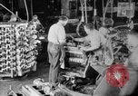 Image of Assembling engines in an Studebaker automobile plant South Bend Indiana USA, 1920, second 16 stock footage video 65675071729