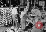 Image of Assembling engines in an Studebaker automobile plant South Bend Indiana USA, 1920, second 18 stock footage video 65675071729