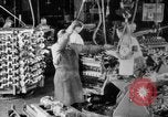 Image of Assembling engines in an Studebaker automobile plant South Bend Indiana USA, 1920, second 20 stock footage video 65675071729