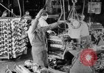 Image of Assembling engines in an Studebaker automobile plant South Bend Indiana USA, 1920, second 21 stock footage video 65675071729