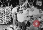 Image of Assembling engines in an Studebaker automobile plant South Bend Indiana USA, 1920, second 22 stock footage video 65675071729