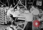 Image of Assembling engines in an Studebaker automobile plant South Bend Indiana USA, 1920, second 23 stock footage video 65675071729