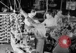 Image of Assembling engines in an Studebaker automobile plant South Bend Indiana USA, 1920, second 25 stock footage video 65675071729