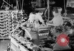 Image of Assembling engines in an Studebaker automobile plant South Bend Indiana USA, 1920, second 27 stock footage video 65675071729