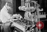 Image of Assembling engines in an Studebaker automobile plant South Bend Indiana USA, 1920, second 36 stock footage video 65675071729