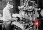 Image of Assembling engines in an Studebaker automobile plant South Bend Indiana USA, 1920, second 42 stock footage video 65675071729