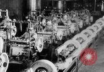 Image of Assembling engines in an Studebaker automobile plant South Bend Indiana USA, 1920, second 47 stock footage video 65675071729