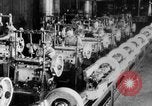 Image of Assembling engines in an Studebaker automobile plant South Bend Indiana USA, 1920, second 50 stock footage video 65675071729