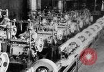 Image of Assembling engines in an Studebaker automobile plant South Bend Indiana USA, 1920, second 53 stock footage video 65675071729
