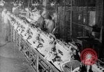 Image of Assembling engines in an Studebaker automobile plant South Bend Indiana USA, 1920, second 58 stock footage video 65675071729