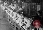 Image of Assembling engines in an Studebaker automobile plant South Bend Indiana USA, 1920, second 60 stock footage video 65675071729