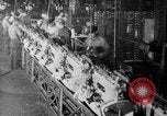Image of Assembling engines in an Studebaker automobile plant South Bend Indiana USA, 1920, second 61 stock footage video 65675071729