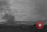 Standbild Bombardierung Insel Tinian Marianen, 1944, aus Sekunde 11 historischem Filmmaterial Videoclip 65675071813
