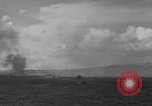 Standbild Bombardierung Insel Tinian Marianen, 1944, aus Sekunde 14 historischem Filmmaterial Videoclip 65675071813