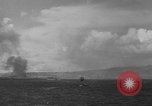 Standbild Bombardierung Insel Tinian Marianen, 1944, aus Sekunde 17 historischem Filmmaterial Videoclip 65675071813