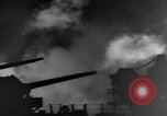 Image of Silhouettes of U.S. Army soldiers boarding a troop transport ship. Pacific Theater, 1942, second 10 stock footage video 65675071824