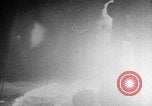 Image of Silhouettes of U.S. Army soldiers boarding a troop transport ship. Pacific Theater, 1942, second 11 stock footage video 65675071824