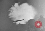 Image of Silhouettes of U.S. Army soldiers boarding a troop transport ship. Pacific Theater, 1942, second 17 stock footage video 65675071824