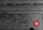 Image of Silhouettes of U.S. Army soldiers boarding a troop transport ship. Pacific Theater, 1942, second 32 stock footage video 65675071824