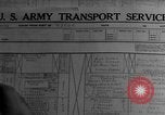Image of Silhouettes of U.S. Army soldiers boarding a troop transport ship. Pacific Theater, 1942, second 35 stock footage video 65675071824