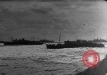 Image of Silhouettes of U.S. Army soldiers boarding a troop transport ship. Pacific Theater, 1942, second 42 stock footage video 65675071824
