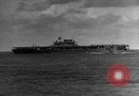 Image of Silhouettes of U.S. Army soldiers boarding a troop transport ship. Pacific Theater, 1942, second 53 stock footage video 65675071824