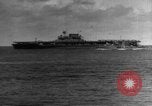 Image of Silhouettes of U.S. Army soldiers boarding a troop transport ship. Pacific Theater, 1942, second 54 stock footage video 65675071824