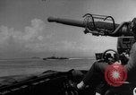 Image of Silhouettes of U.S. Army soldiers boarding a troop transport ship. Pacific Theater, 1942, second 55 stock footage video 65675071824