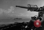 Image of Silhouettes of U.S. Army soldiers boarding a troop transport ship. Pacific Theater, 1942, second 56 stock footage video 65675071824
