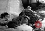 Image of Silhouettes of U.S. Army soldiers boarding a troop transport ship. Pacific Theater, 1942, second 59 stock footage video 65675071824