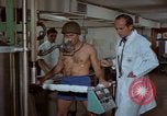 Image of physical fitness exercises United States USA, 1970, second 45 stock footage video 65675071869