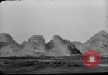 Image of buildings burn China, 1945, second 21 stock footage video 65675071924